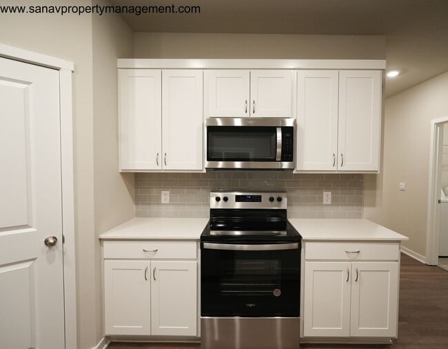 Photo - "Ranch Retreat: Seamless Serenity in Single-Level Splendor with Trailside Tranquility"