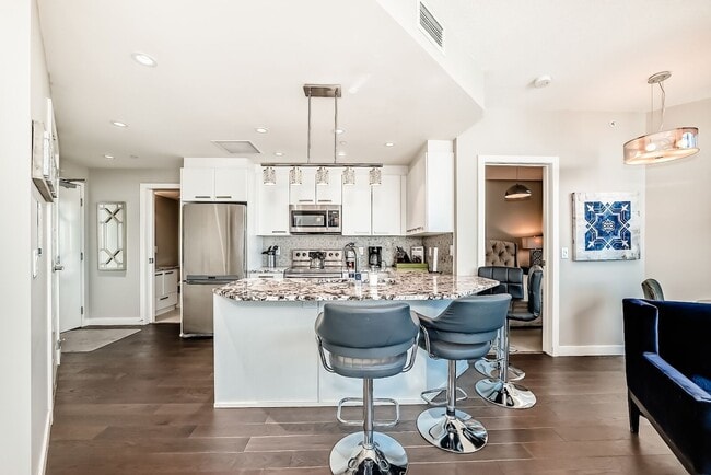 225-2110-211 11 Ave SE