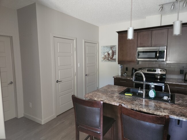 Building Photo - 507 Albany Way NW Unit 105