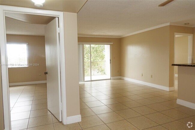 Building Photo - 15221 SW 80th St Unit 307 Rental