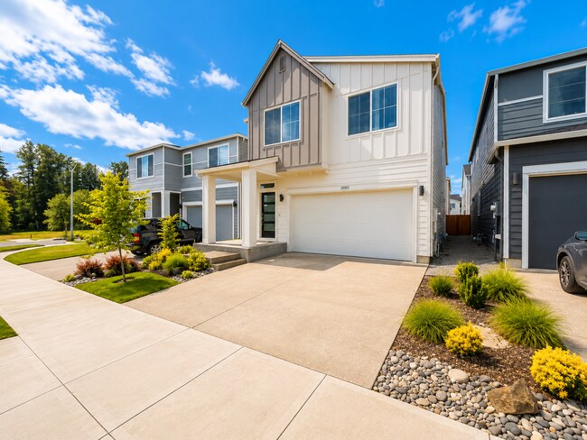 Photo - Stunning 2024 Built 5BR Home with Main-Level Suite, EV Charger & Covered Patio Near River Terrace