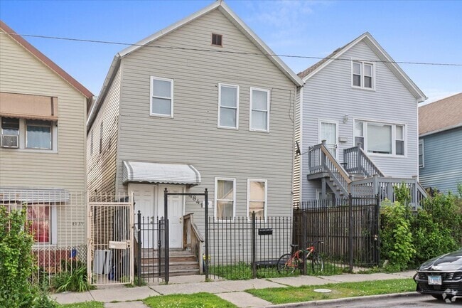 Building Photo - 4841 S Loomis Blvd Unit 1R Rental