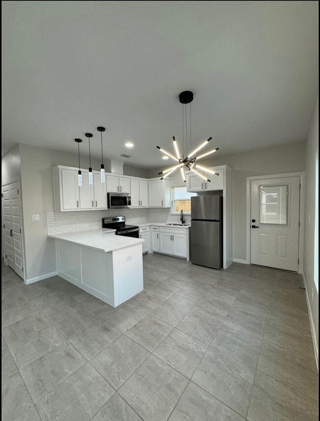 Building Photo - 3524 S Dominique Dr Unit 3