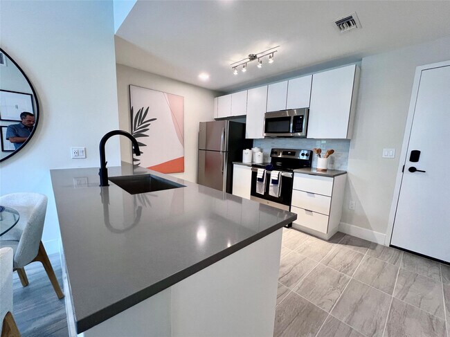 Building Photo - 120 N Compass Way Unit 435