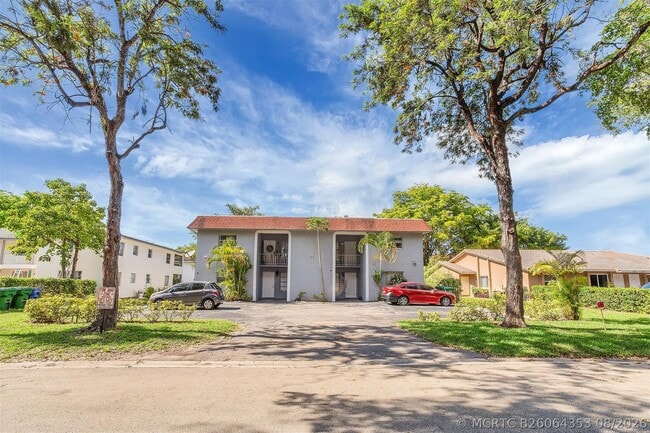 Building Photo - 10131 NW 35th St Unit 16
