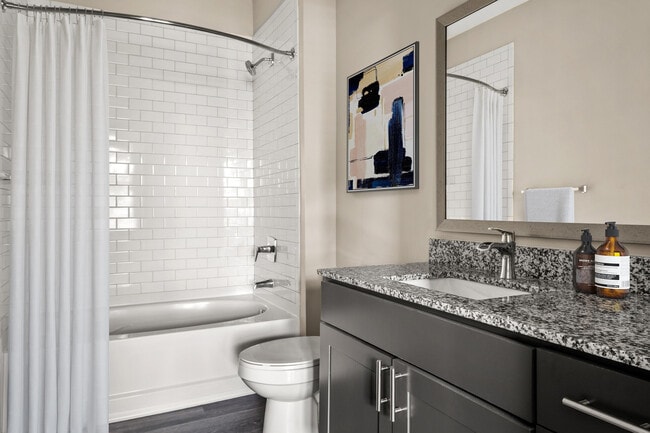Explore this chic bathroom, designed to offer luxury and sophistication. - The Sawyer at One Bellevue Place