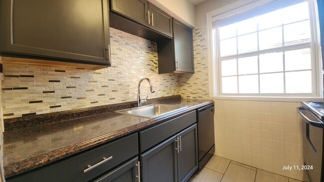 Building Photo - 6328 Sutherland Ave Unit 1W Rental