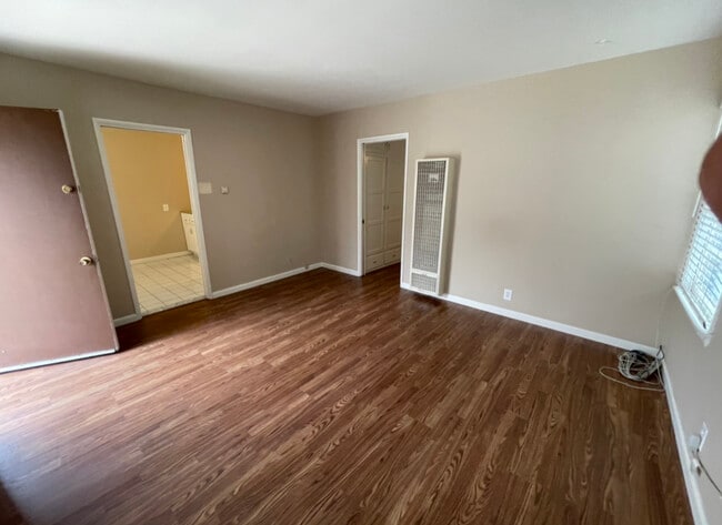 Enter the livingroom looking into kitchen - 2540 W Ramona Rd Unit A
