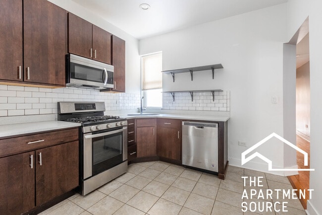 Building Photo - 4736 W Armitage Ave Unit 1