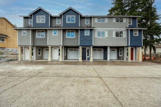 Building Photo - Move in Special! Carefree living in vibrant downtown Puyallup!
