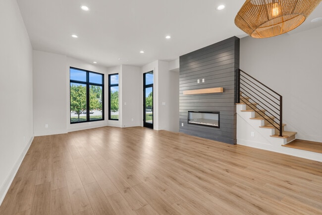 living room next to dining and kitchen - 671 E 16th St