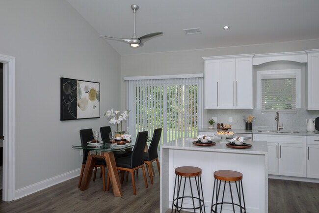 Shaker Wood Cabinets, Nickel Hardware. Sliders to Patio - Fairfield Greens South At Holbrook