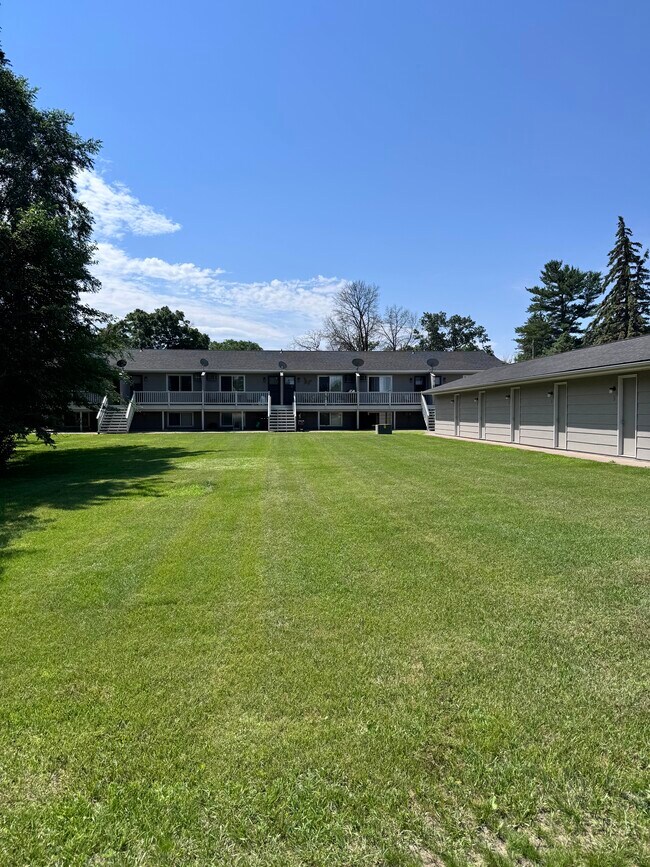 Decks overlook open yard - 3709 229th Ln NW Unit #1
