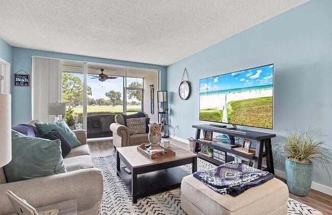 Photo - Annual OR Seasonal turnkey FURNISHED 2/2 ground floor condo with golf course and water views