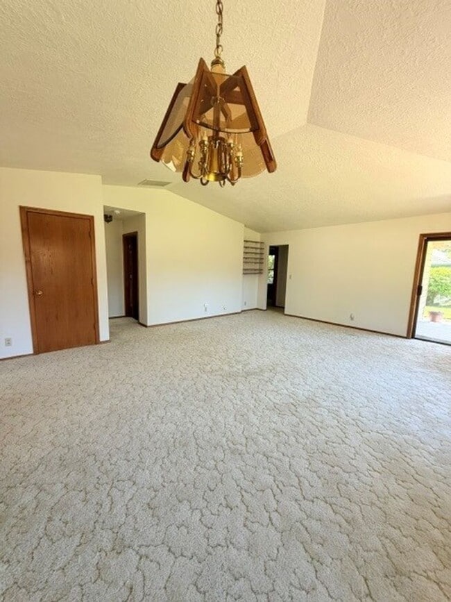 Photo - Charming 3-Bedroom Home with Garage & Lawn Care Included
