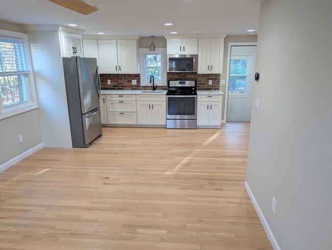 View into kitchen from living area - 63 Buttles Rd Unit Buttles Rd In-law