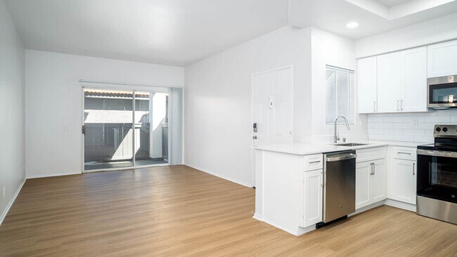 Living Room with Patio and Hard Surface Flooring