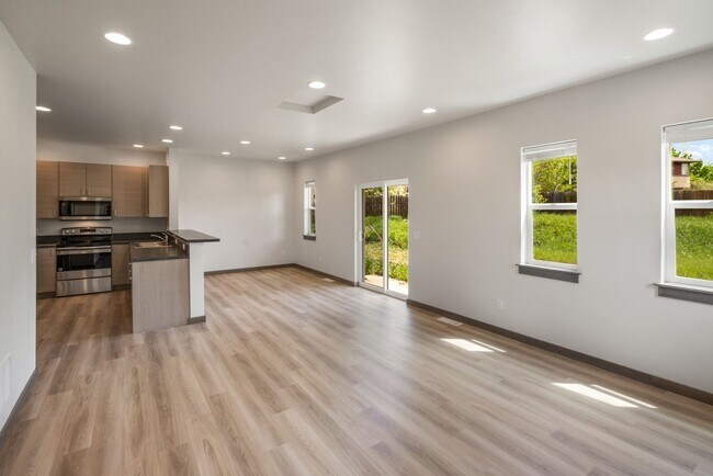 Photo - Gorgeous 3 Bedroom condos with double stall attached garages with AC-one pet negotiable!!!!