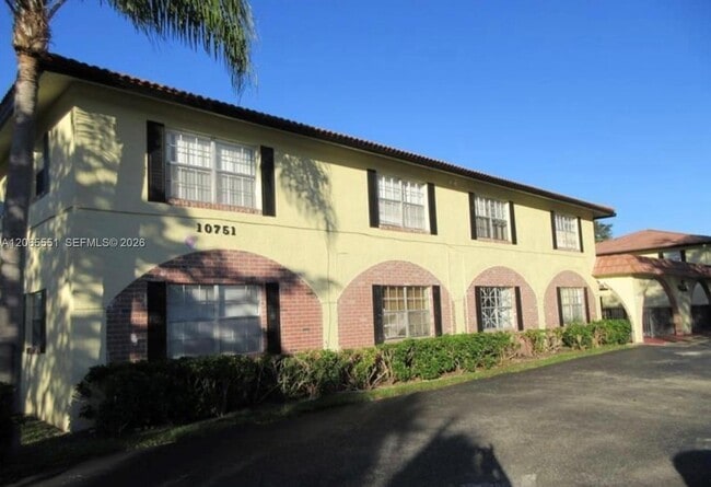 Building Photo - 10751 Royal Palm Blvd Unit 17