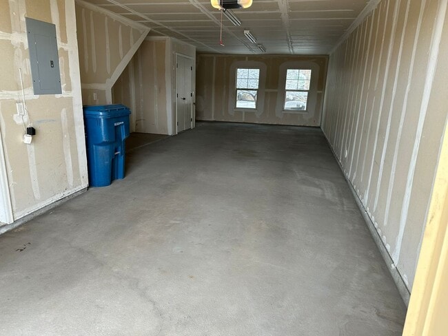 Photo - Large garage with attached spacious 2 bedroom townhome