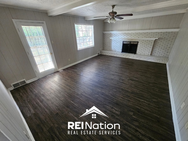 Photo - HUGE 4BR/2.5BA MEMPHIS HOME! | Vinyl Plank & Brick Fireplace | Fenced Yard!