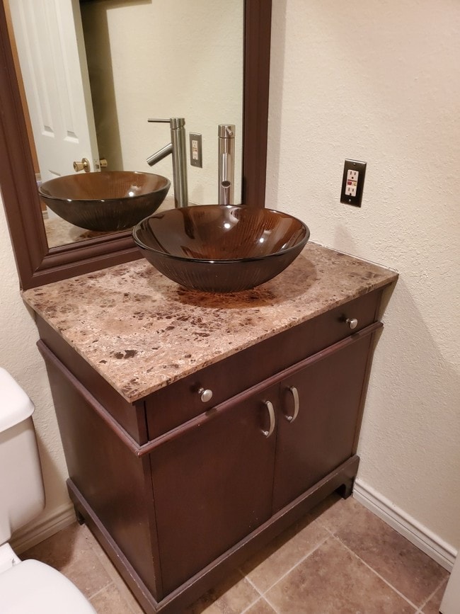 Half Bathroom with Granite Countertop - 3635 Garden Brook Dr Unit 14200