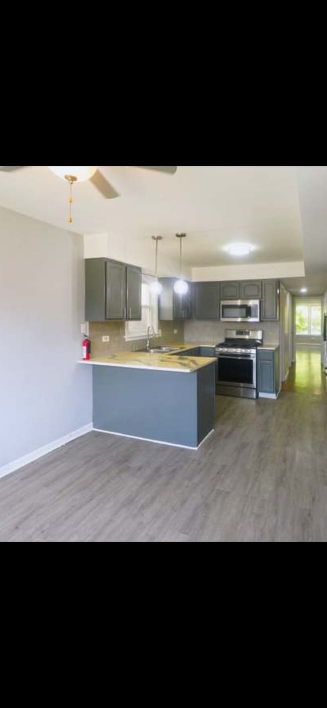 Building Photo - 7950 S Lafayette Ave Unit Apartment