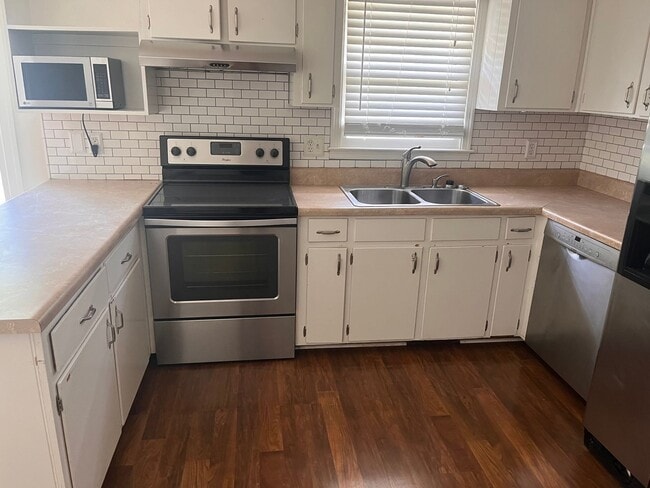 Photo - Outdoor Living Dream: Ranch-style home wit...