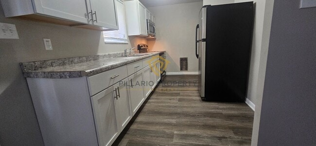 Building Photo - Renovated 1-Bedroom at Campbell Apartments Near Downtown Available NOW! Unit 1446