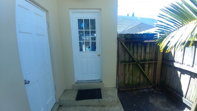 Laundry room on left