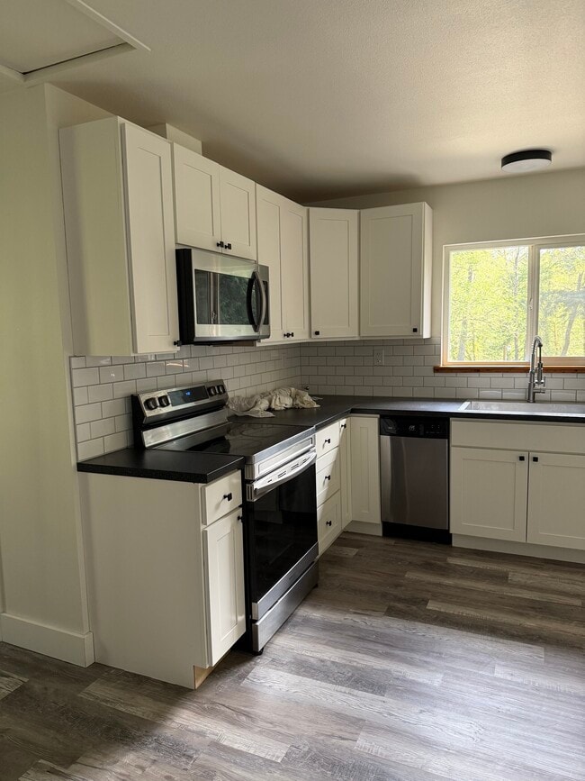 Building Photo - 5644 Crawford Rd Unit Langley Apt
