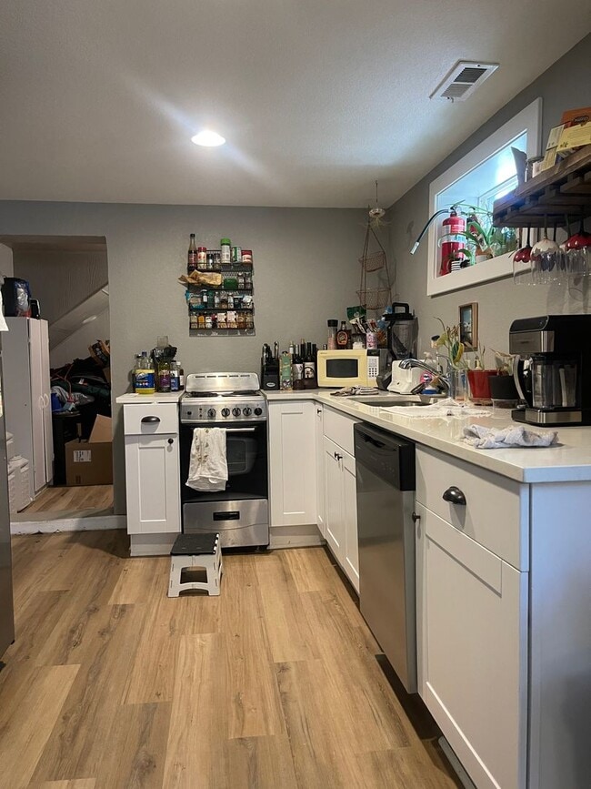 Building Photo - Updated 2 Bedroom 1 Bathroom Lower Level Apartment in Bungalow in Denver's Barnum Neighborhood Unit #B