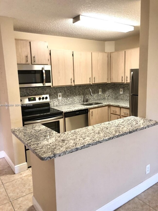 Photo - 10717 Cleary Blvd Unit 303