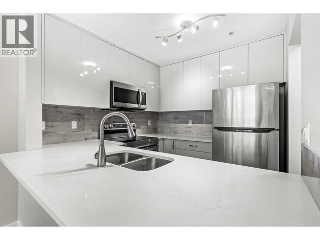 Photo - 2929 W 4th Ave Unité 402