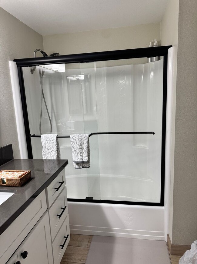 Photo - Charming 2-Bedroom, 1.5-Bath Apartment with Private Yard and 1 Car Garage Unit A