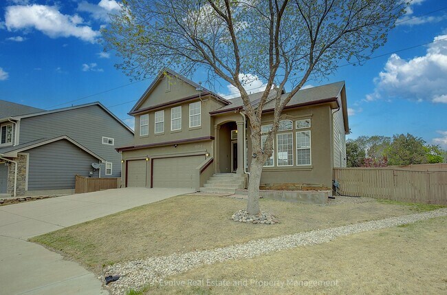 Photo - Evolve Real Estate: Spacious 4-Bedroom Home with Finished Basement & 3-Car Garage in Thornton- Av...