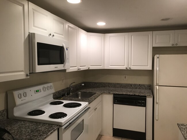 new white kitchen - 480 NW 20th St Condo