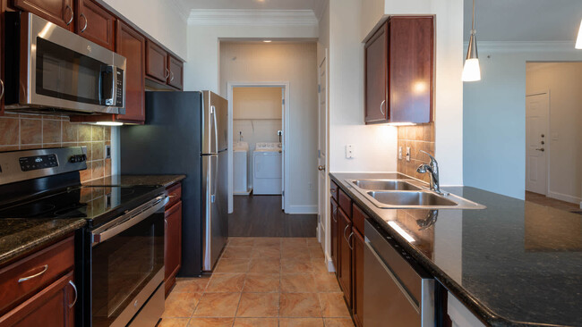 Kitchen with Stainless Steel Appliances - Quarry Hills Apartments