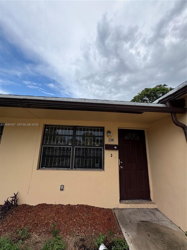 Building Photo - 19121 NW 34th Ct Unit A