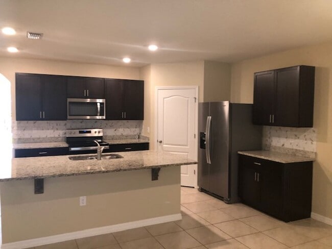 Photo - 4/2 with great FENCED in yard and upgraded!