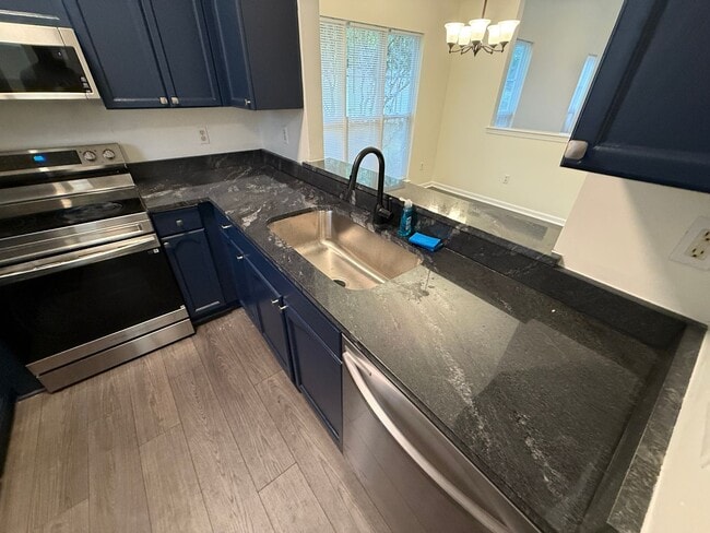 Photo - Beautiful End-unit townhome in university with Primary bedroom on 1st floor