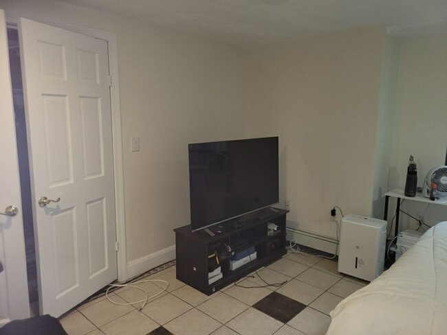 Photo - NO FEE!   Great deal!!!!  Garden level Allston studio with HEAT AND HOT WATER INCLUDED for 9/1!