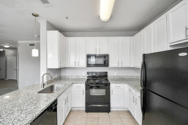 Building Photo - 6777 Sommerall Dr Unit 0811