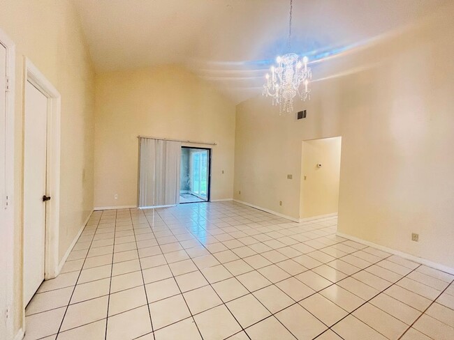 Photo - Beautiful 4 Bed / 2 Bath Single-Family Home with Fenced Yard & Screened Patio