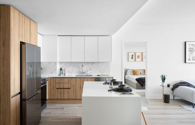 Disfrute cocinando en nuestras cocinas cuidadosamente diseñadas con acabados de alta calidad. - Cascade Link at Douglas