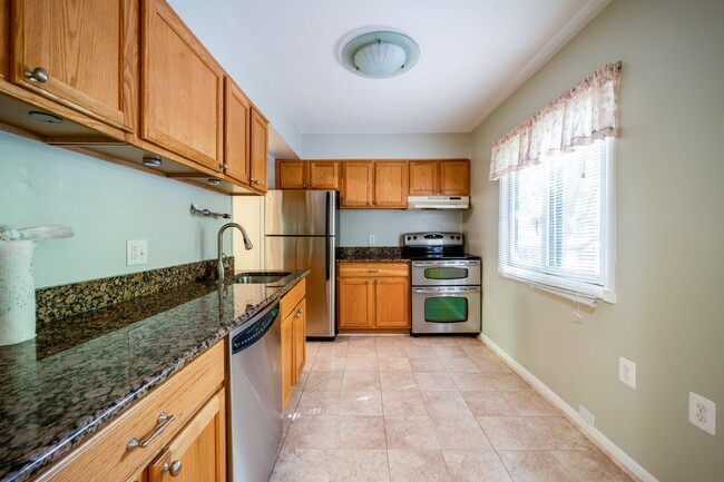 Photo - Renovated townhouse backing to trees with loads of privacy!