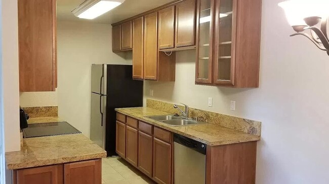 Building Photo - 9909 Azuaga St Unit C203