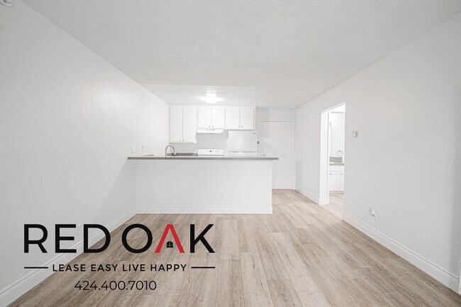 Building Photo - 706 McDonald Ave Unit 304