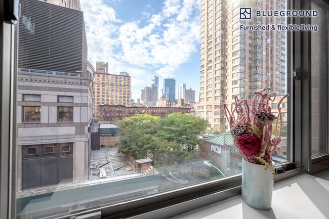 Photo - 311 W 50th St Unidad FL5-ID213