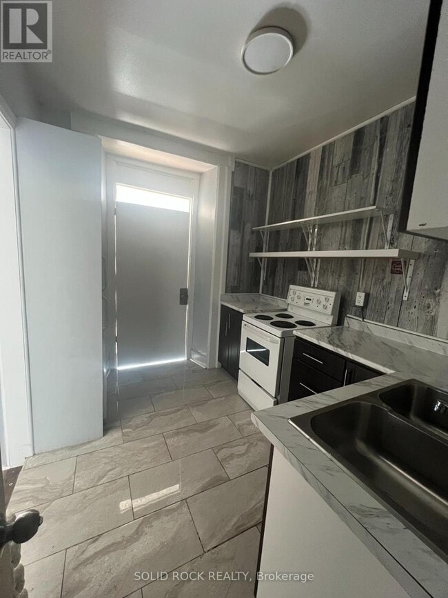 Photo - 89 King St W Unité B4